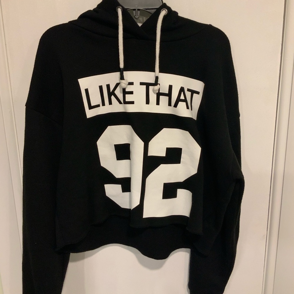 Black cropped sweatshirt.